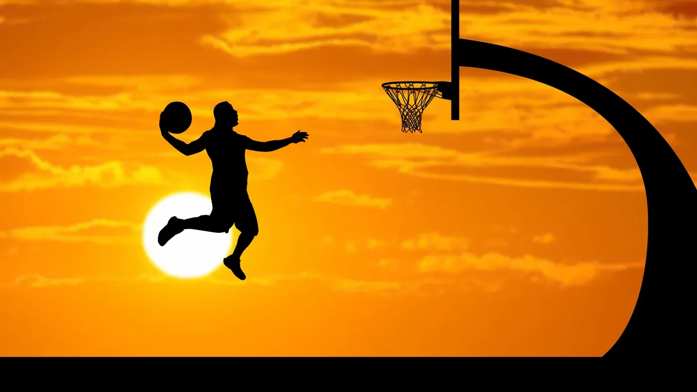 Spelare i en dunk mot korgen
